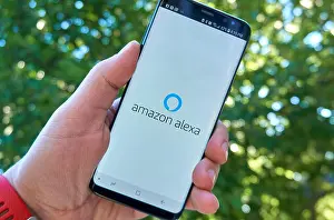 Android Prints: MONTREAL, CANADA - August 28, 2018: Amazon Alexa android app on Samsung s8 screen in a hand