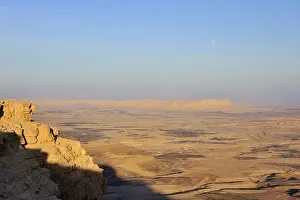 The moon over Ramon crater at the Negev Desert Israel