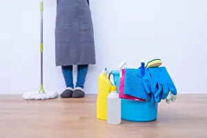 Housework Prints: Mop floors. Young woman washing wooden ground floor at home with a mop