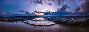 Appalachia Prints: Morning light peeks through the clouds above the Ohio River bridge crossing into Chesapeake Ohio from Huntington