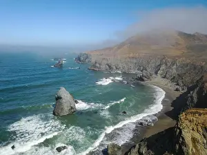 Morning mist sweeps along the scenic coast of northern California in Sonoma. This beautiful area has many easily accessible trails and beaches