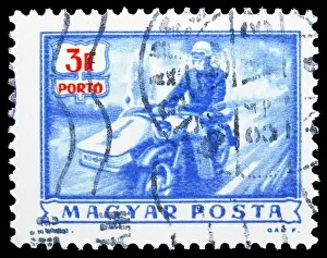 MOSCOW, RUSSIA - JULY 19, 2019: Postage stamp printed in Hungary shows Postman on motorcycle, Postage Due serie, circa 1973