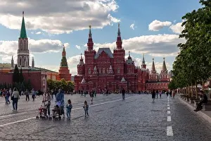 Kremlin Prints: MOSCOW, RUSSIA - JUNE 01, 2021: Tourists walk on Red Square near the Kremlin
