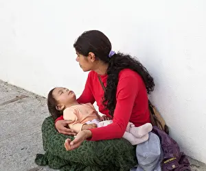 Homeless Prints: Mother begging with child