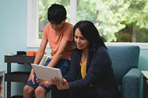 Homey Prints: Mother and son having video call on mobile phone
