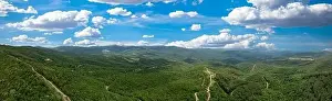 Mount Cholomon, Cholomondas or Holomontas mountain and blue cloudy sky aerial panoramic view