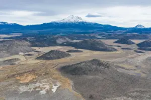 Mount Shasta in northern California is among the largest and most active volcanoes in the Cascade Range. The peak reaches 14, 160 feet in height