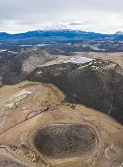 Mount Shasta in northern California is among the largest and most active volcanoes in the Cascade Range. The peak reaches 14, 160 feet in height