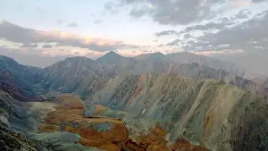 Altay Prints: a mountain breathtaking river flows through the tranquil plain under the large clouds somewhere in the mountains