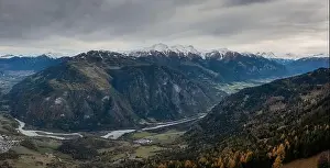 Autumn Colours Prints: Mountain landscape with the Rhine river in the Swiss Alps in late autumn