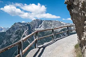 Mountain landscape with snow peaks and trail at bright sunny summer day in Alps, Austria