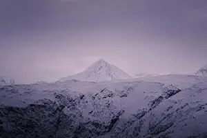 Brim Prints: Mountain peak under pink sky clouds in the Lyngen Alps in northern Norway