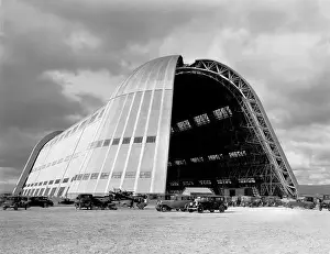 Automobile Prints: Mountain View, California: c. 1935 The dirigible Hangar One at Moffett Field in California