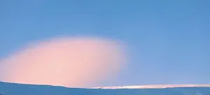 Snow Peak Prints: Mountain winter landscape. Colored dawn over the snow-capped mountains. Drone view