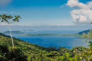Florianopolis Prints: Mountains, lake and ocean with sun light in Santa Catarina island, Brazil. Aerial view