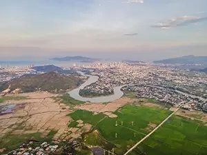 Trang Prints: Mountains, river and city of Nha Trang, view from a drone