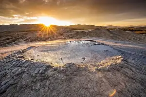 Dramatic Sunset Prints: Muddy Volcanoes, Romania. Buzau County mud volcanoes at sunset