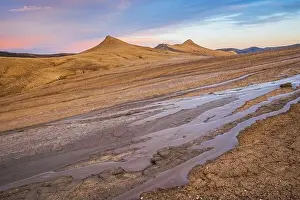 Muddy Volcanoes, Romania. Buzau County mud volcanoes at sunset
