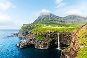 Images Dated 1st August 2019: Mulafossur waterfall in Gasadalur, Vagar Island of the Faroe Islands