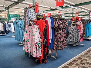 Multi shopping experience in the Ladies clothing department at a retail business park