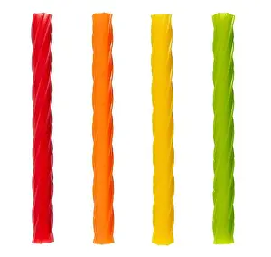 Multicolored jelly candies in the shape of the sticks on a white background
