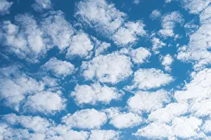 Cumulus Prints: Multiple clouds on blue sky background