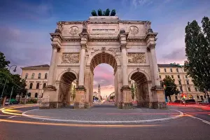 Munich, Germany. Cityscape image of Munich, Bavaria, Germany with the Siegestor at summer sunset