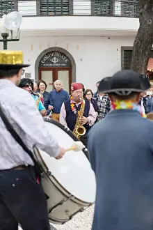 Disguise Prints: Musicians in a street band in Funchal, Madeira at the Madeira Festival