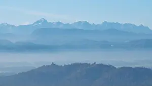 Infinity Prints: mystical scenery with layers of mountains in a beautiful landscape with hilltops softly peaking out of white clouds