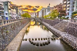 Images Dated 10th December 2012: Nagasaki, Japan cityscape with Megane Spectacles Bridge at sunset