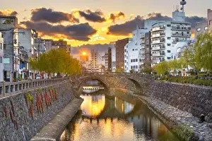 Nagasaki, Japan cityscape with Megane Spectacles Bridge at sunset