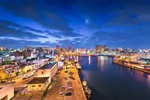 Naha, Okinawa, Japan downtown skyline at dawn from Tomari Port