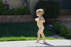 30 Years Prints: naked toddler walking on sidewalk