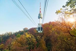 Images Dated 5th November 2017: Namsan N Seoul Tower with the line of cable car at the sunset time in autumn at Seoul, South Korea