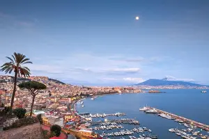 Naples, Italy aerial skyline on the bay with Mt. Vesuvius at dusk