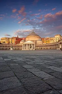 Naples, Italy. Cityscape image of Naples, Italy with the view of large public town square Piazza del Plebiscito at sunrise