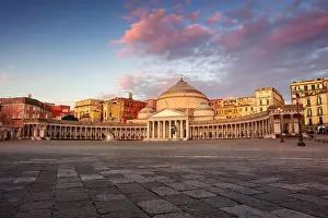 Naples, Italy. Cityscape image of Naples, Italy with the view of large public town square Piazza del Plebiscito at sunrise