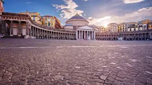 Naples, Italy. Cityscape image of Naples, Italy with the view of large public town square Piazza del Plebiscito at sunset