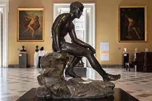Contemplation Prints: NAPLES, ITALY – DEC 09 2025: Bronze statue of Hermes displayed in the National Archaeological Museum of Naples