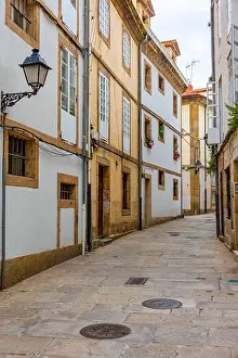 Galicia Prints: Narrow street in the old town of A Coruna, Spain