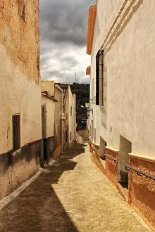 Lantern Prints: Narrow streets and old facades in Jorquera village, Castilla la Mancha community, Spain