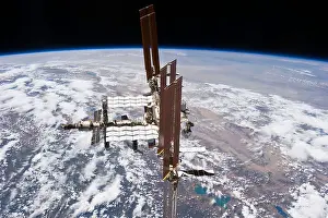 International Space Station Prints: NASA image of International Space Station (ISS) flying above earth