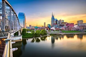 Water Tourism Prints: Nashville, Tennessee, USA downtown city skyline at dusk on the Cumberland River