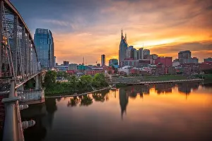 Nashville, Tennessee, USA downtown city skyline at dusk on the Cumberland River