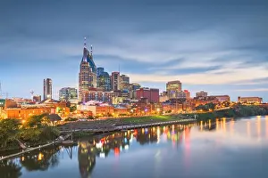 Nashville, Tennessee, USA skyline on the Cumberland River at night