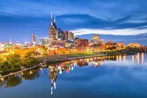 Nashville, Tennessee, USA skyline on the Cumberland River at night