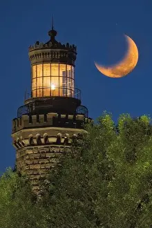 Historic Landmark Prints: Navesink Twin Lights - Close view to one of the illuminated Lighthouse with the setting moon alongside