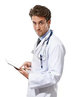 Practitioner Prints: You need to keep healthy. Portrait of a young doctor holding a clipboard and smiling at the camera