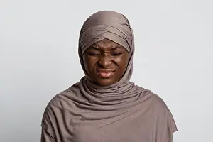 Empty Space Prints: Negative Emotion. Irritated Black Muslim Lady In Hijab With Displeased Face Expression