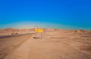 Street Sign Prints: Negev, Israel - January 3, 1995: street sign firing zone for next 39 kilometer in the desert Negev in Israel